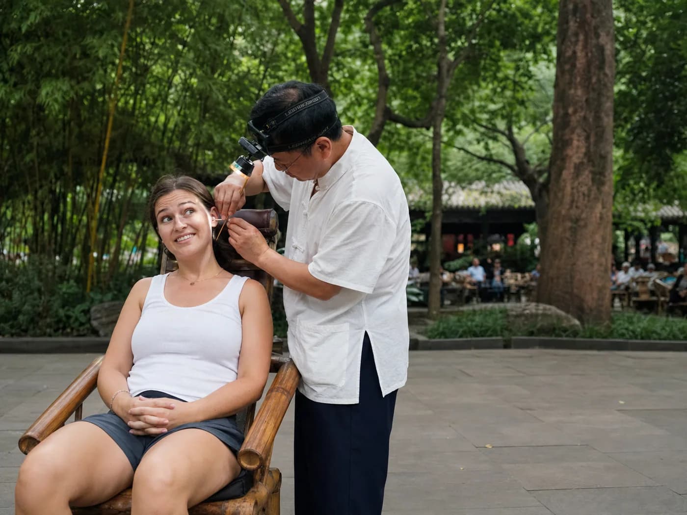 Traveler trying ear cleaning service