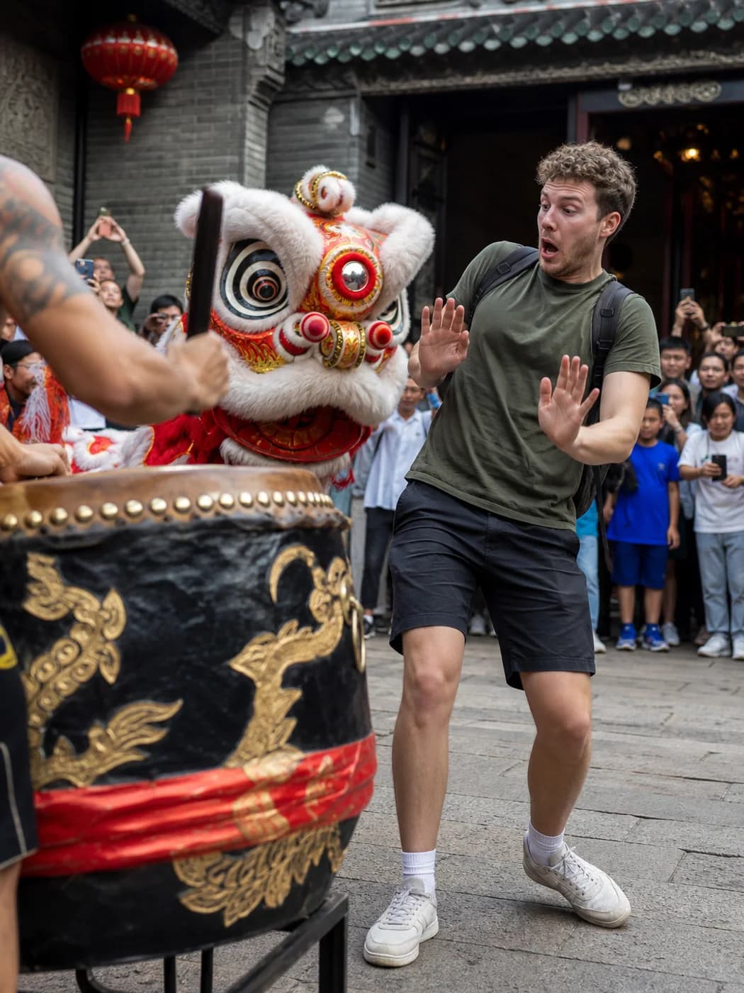 Traveler reacting to lion dance drum