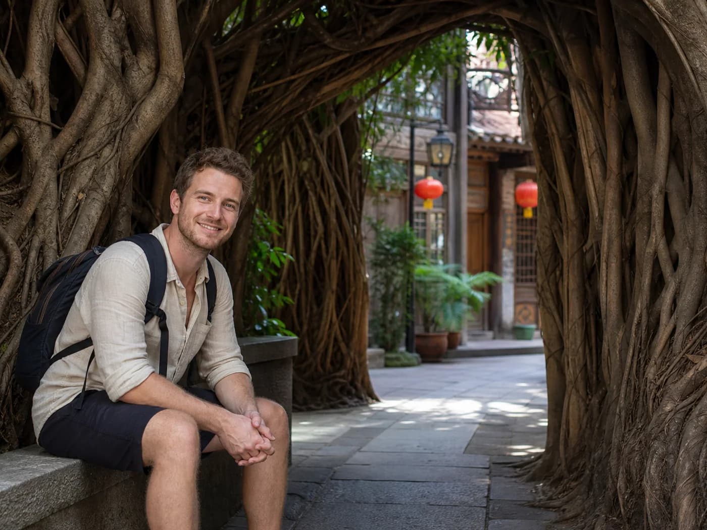 Travelers resting under banyan