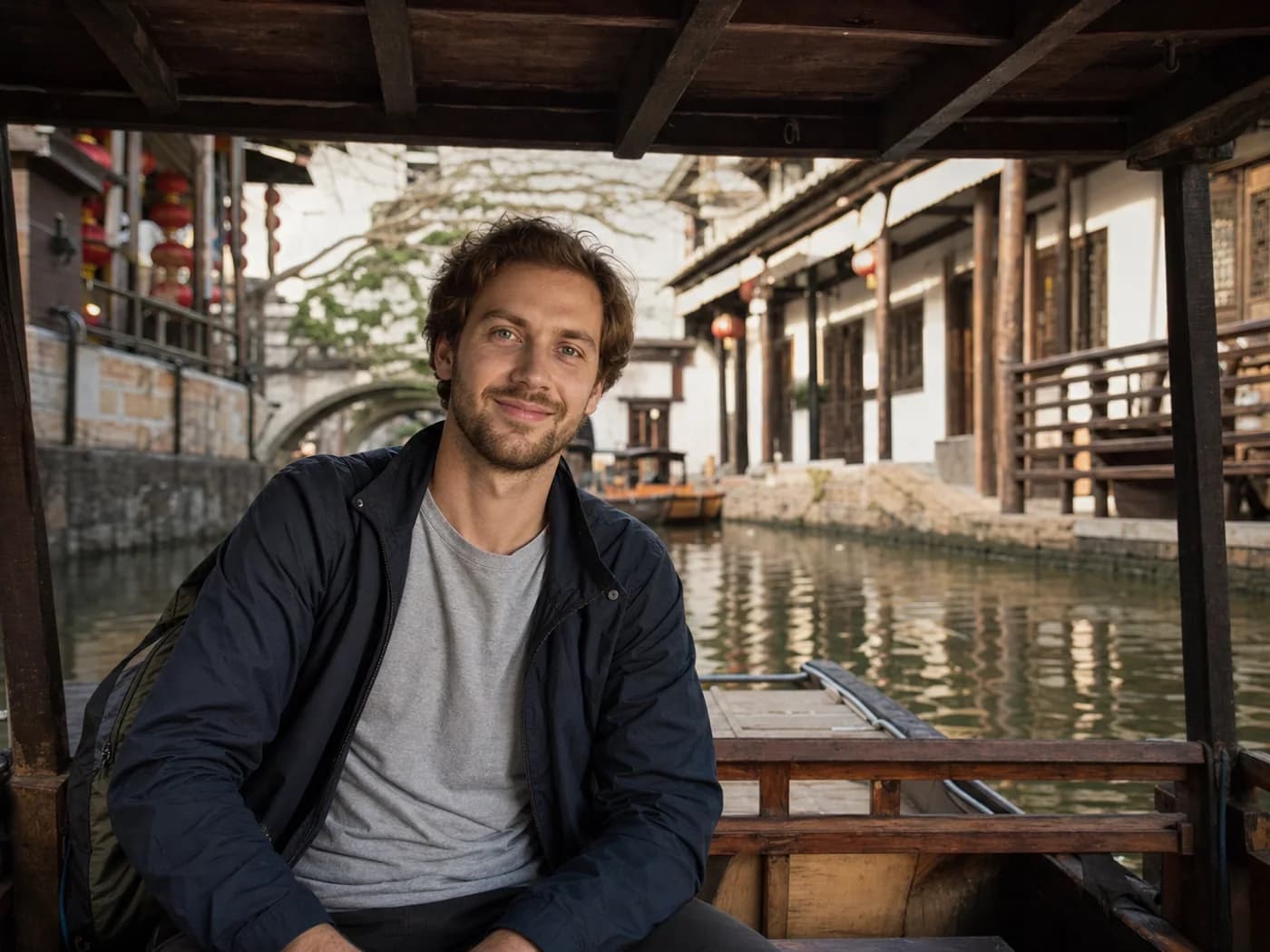 Travelers on Sanhe canal boat