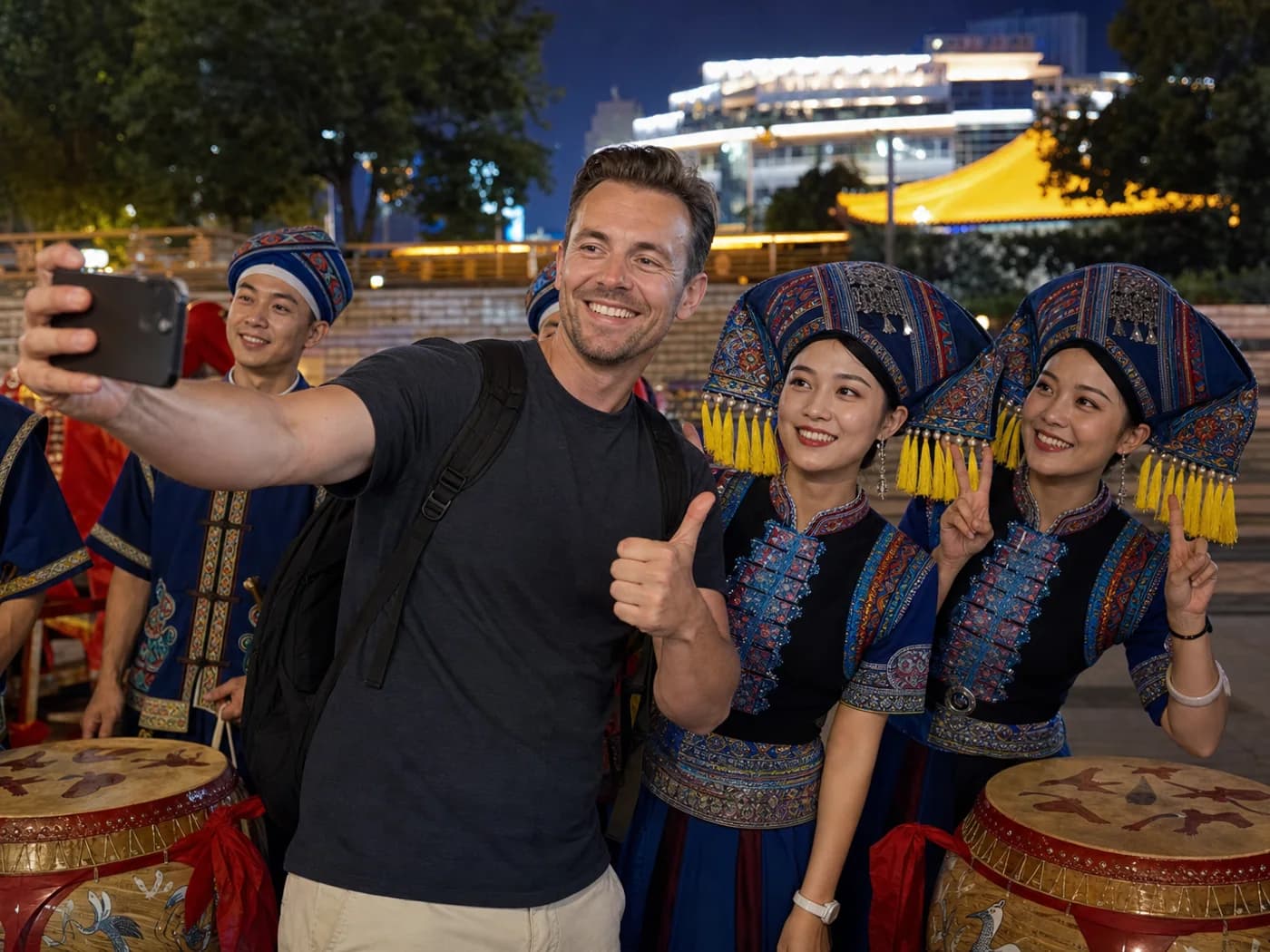 Travelers with Zhuang performers