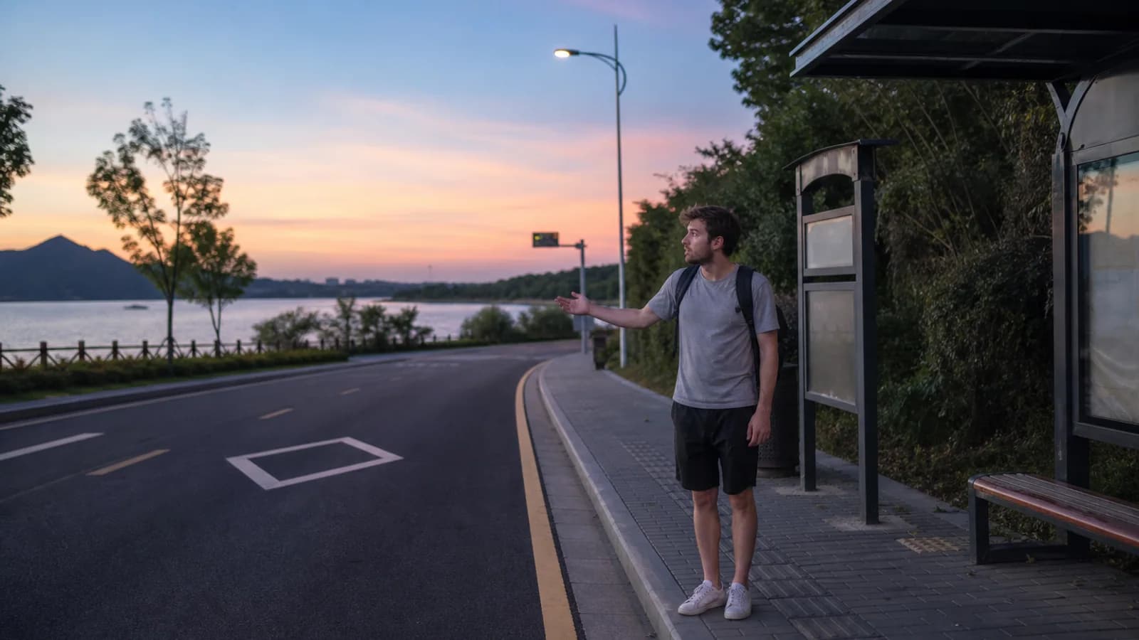 Traveler waiting for ride at lake