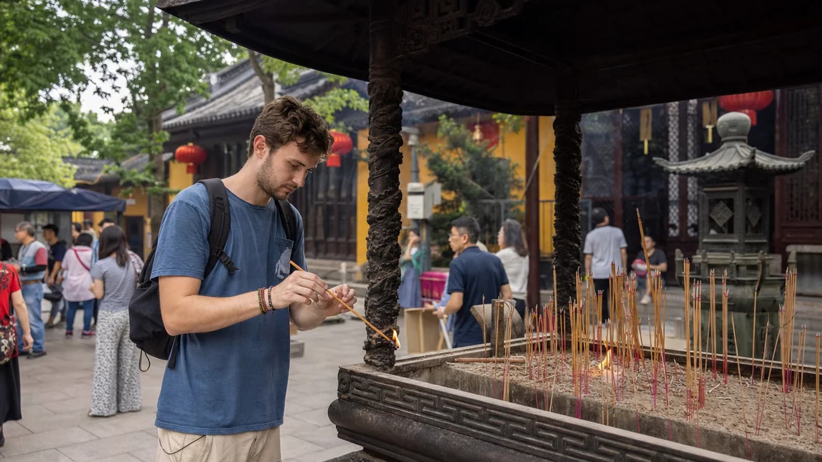 Visitor learning incense ritual in Wuxi