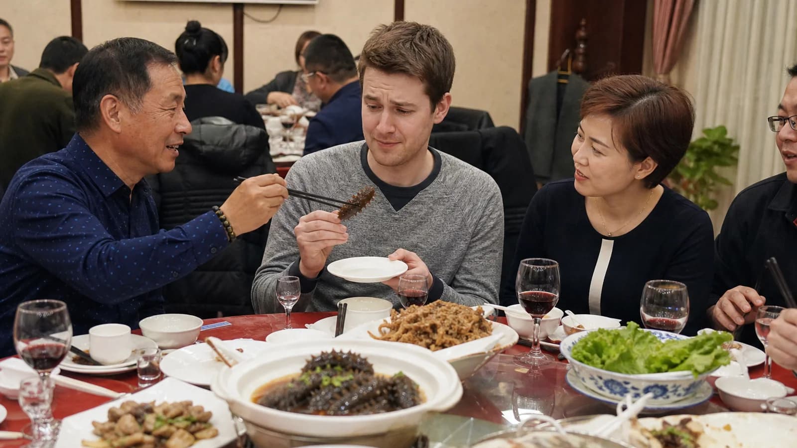 Travelers trying Shandong sea cucumber