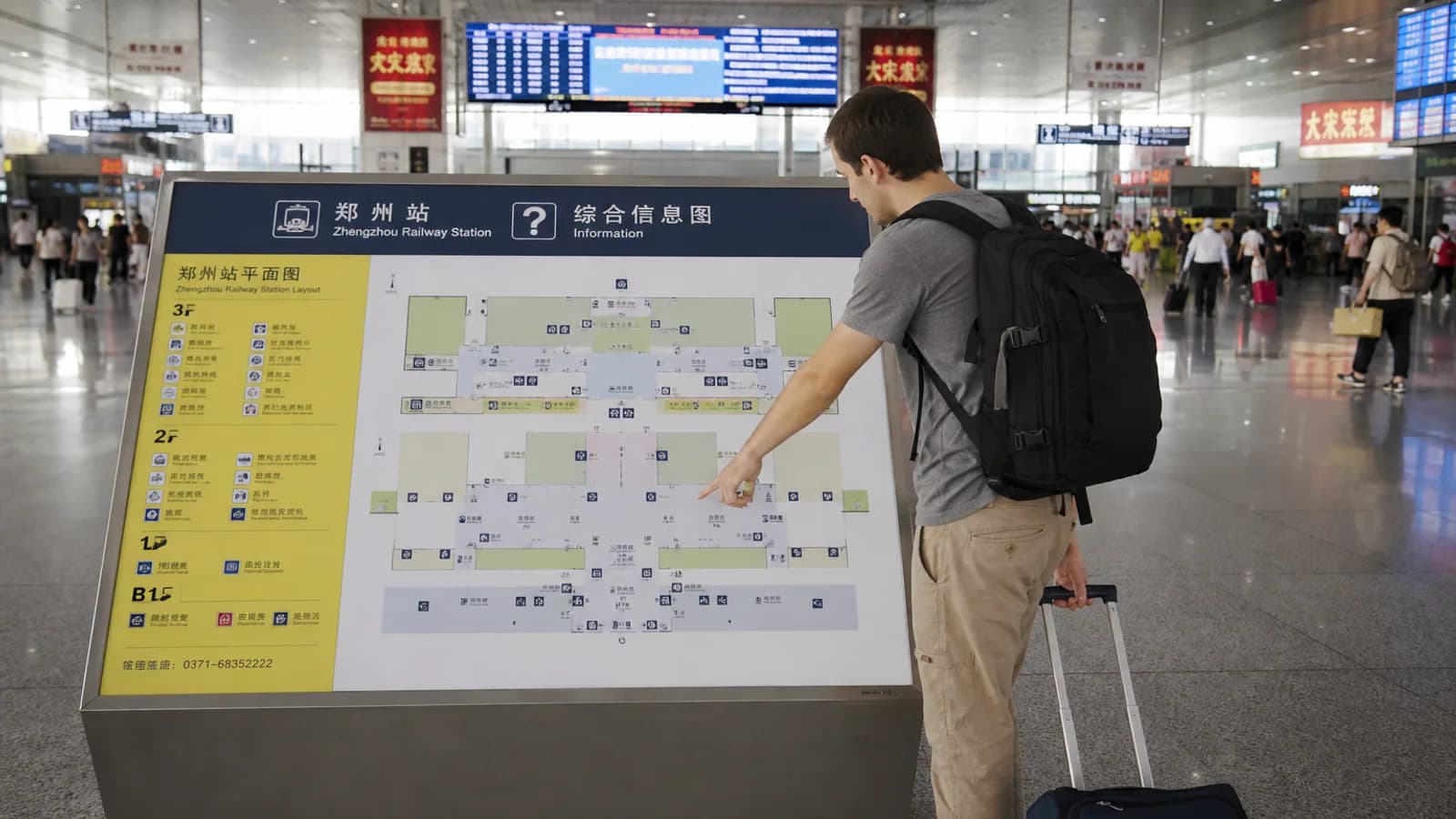 Traveler planning excursion at station