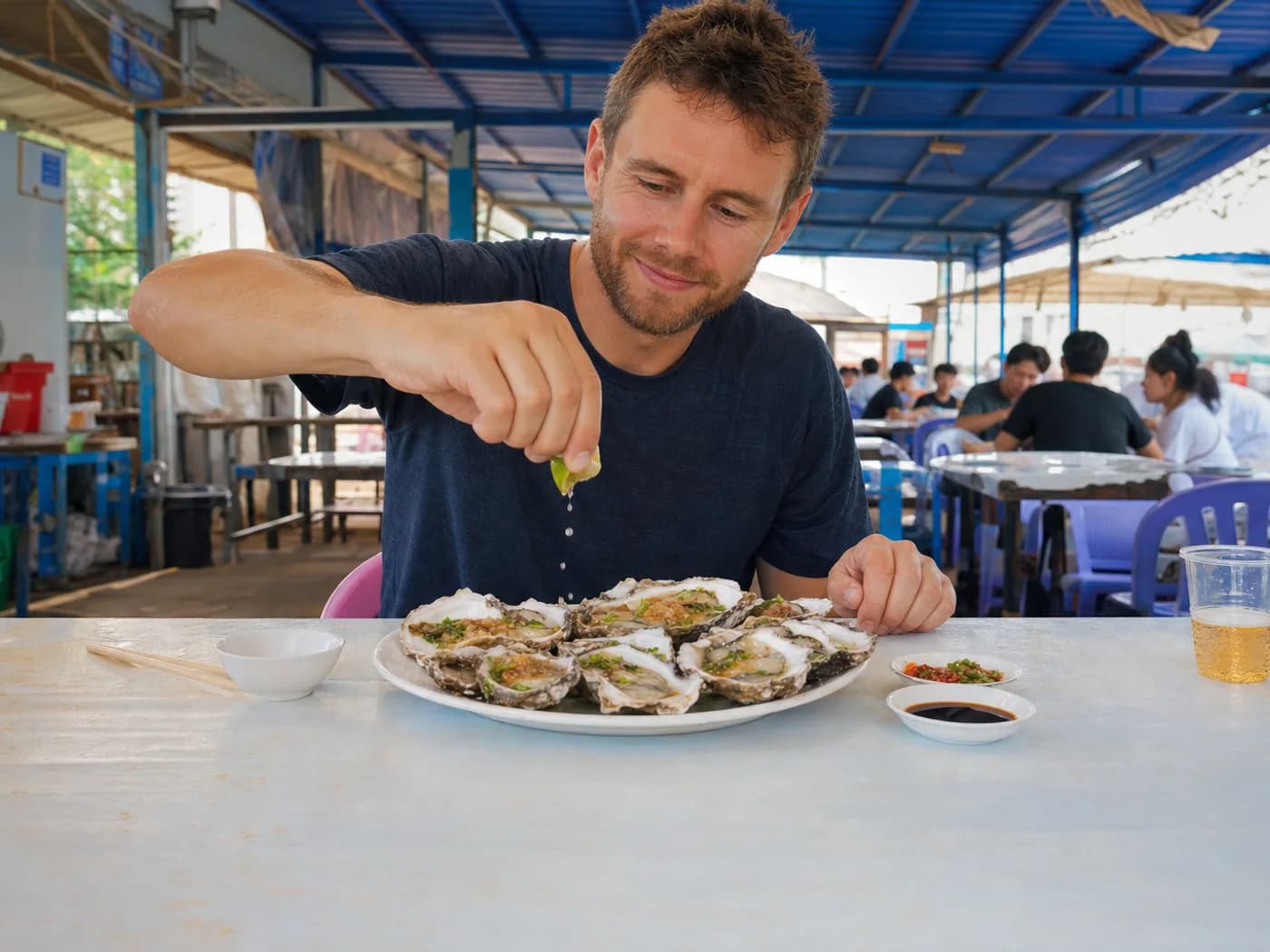 Traveler eating steamed oysters